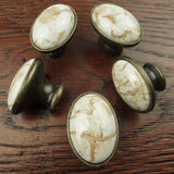 DIY Décor Hub: 10 Antique Brass Ceramic Oval Knobs with a Brown Marble Accent