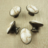 DIY Décor Hub: 20 Antique Brass Ceramic Oval Knobs with a Brown Marble Accent